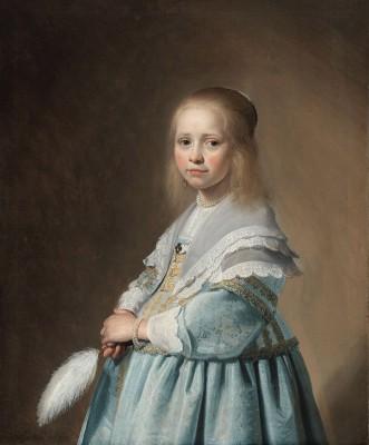 Portrait of a girl in blue outdoors