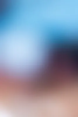 Blurred outdoor scene in red and blue hues